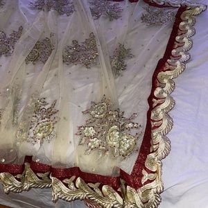 Off white maroon net saree party wear